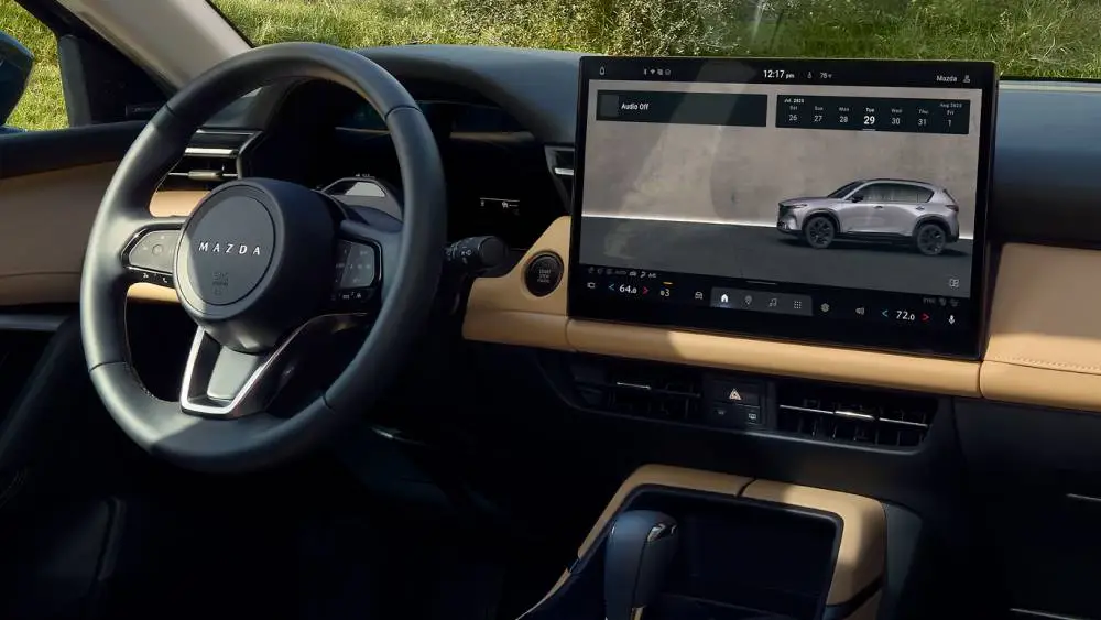 2026 Mazda CX-5 exterior driving on the road