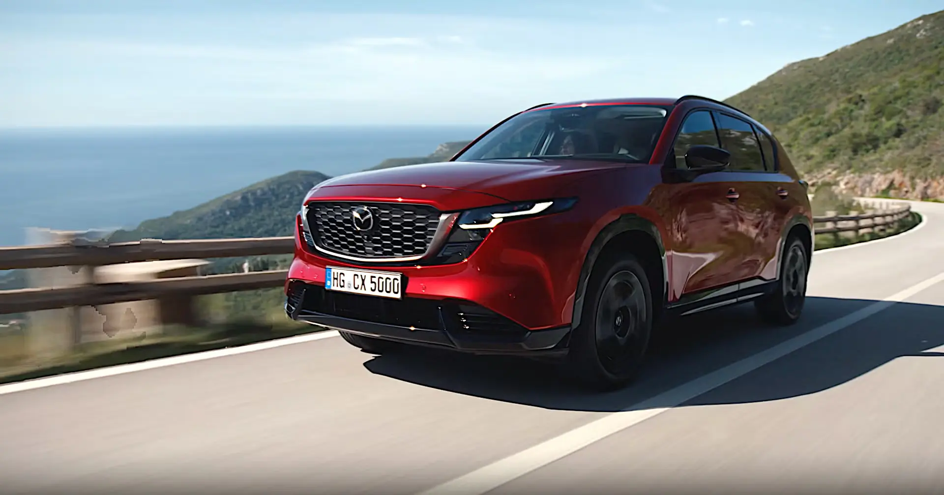 2026 Mazda CX-5 exterior driving on the road
