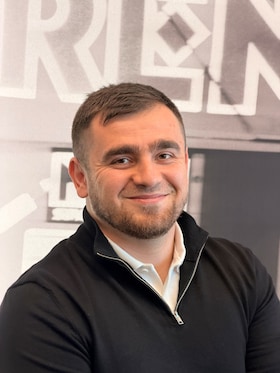 Staff member Alizaman Aznaurov from ID_ad7221