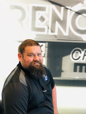 Staff member Bradley Gilbert from ID_378389
