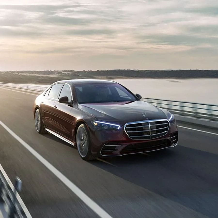 S 580 4MATIC in Rubellite Red with AMG Line and 20-inch AMG multispoke wheels