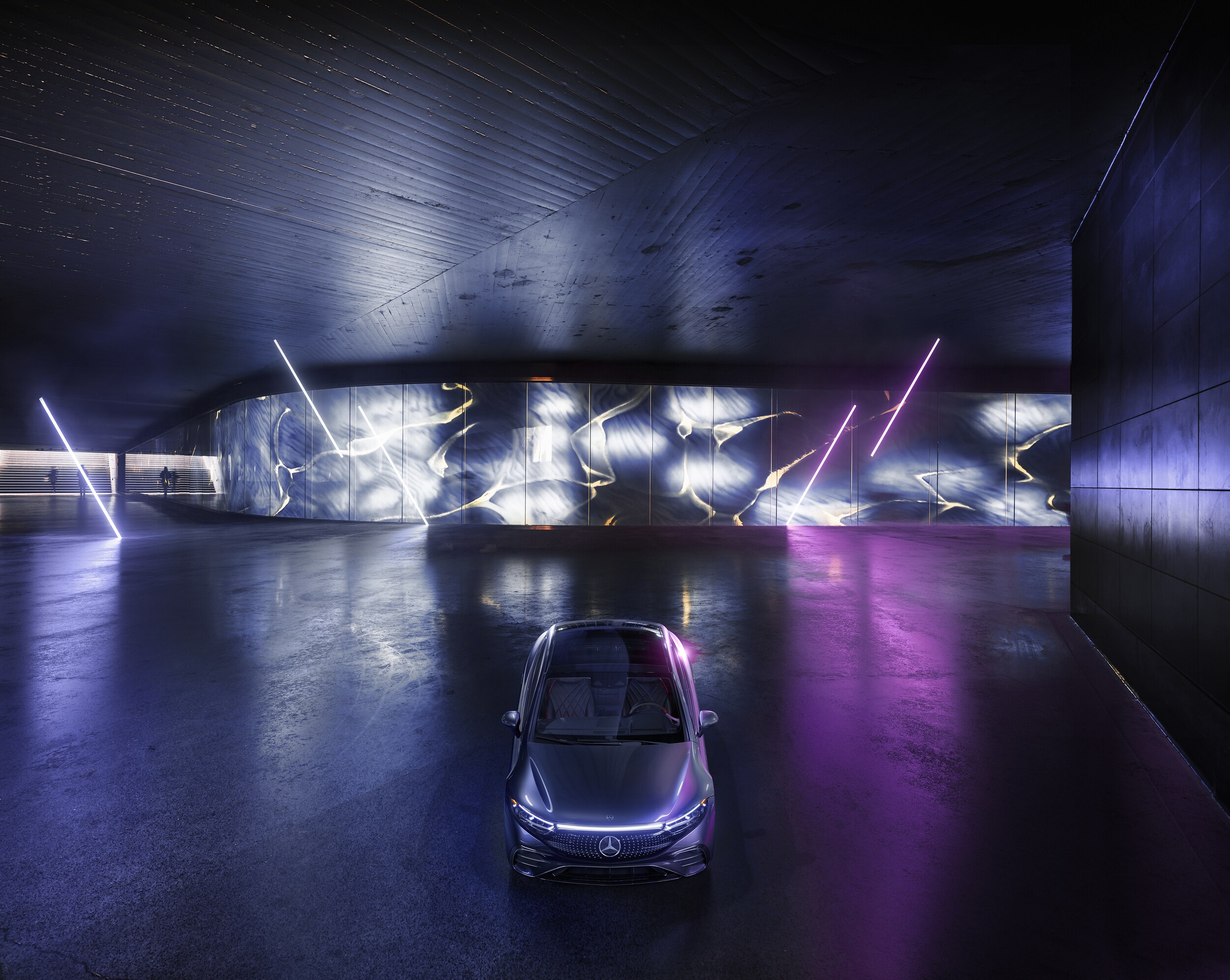 2023-MercedesBenz-EQS-Launch-Sedan-L02.jpg 2022 EQS Sedan in front of purple neow lights