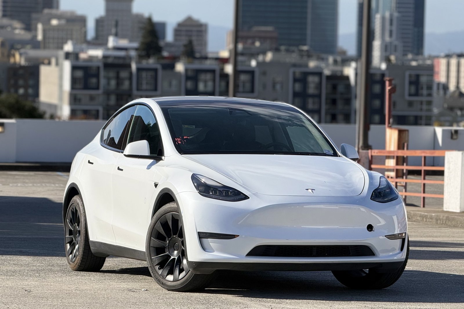 Used 2024 Tesla Model Y Long Range with VIN 7SAYGDEE7RA227498 for sale in Oakland, CA