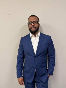 Staff member Eloy Mercedes from ID_609829