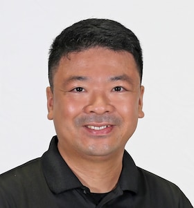 Staff member Nick Ying from 30ef390394ad