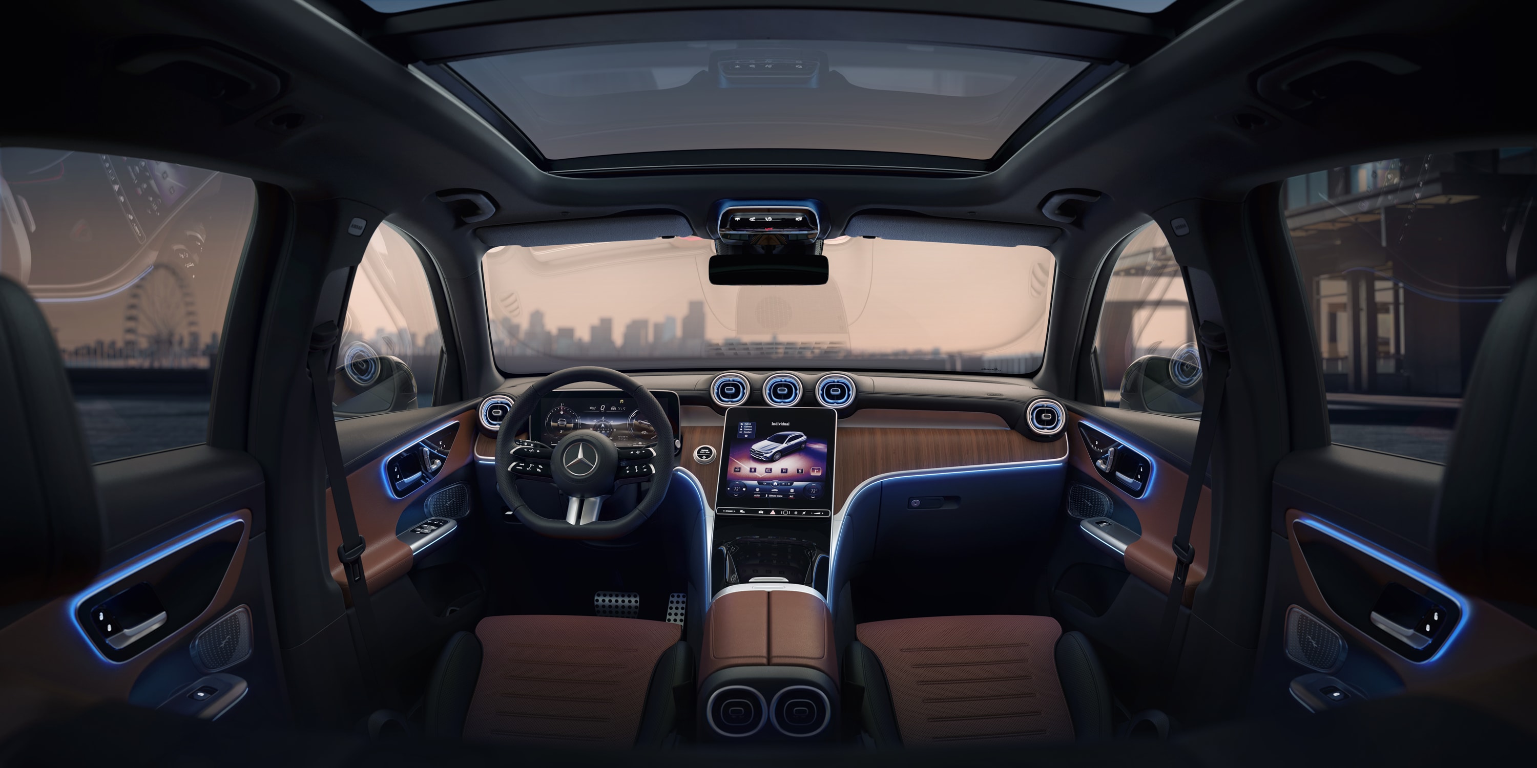 Interior shot of 2023 GLC 300 SUV with console screen and lights around doors
