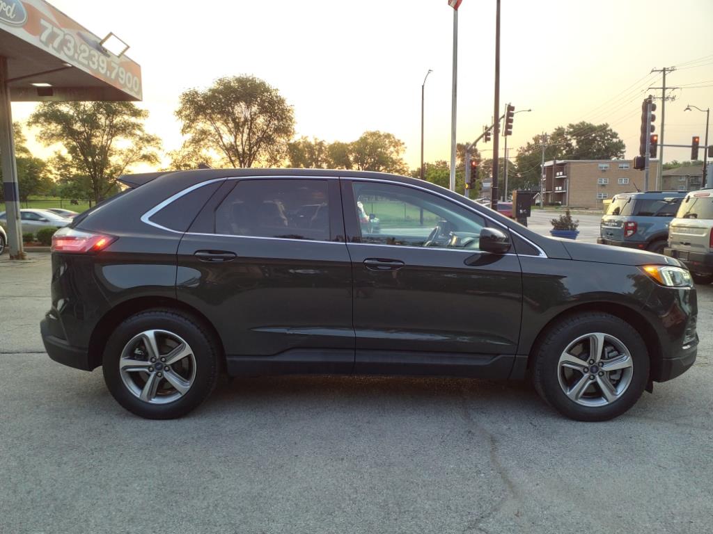 Used 2022 Ford Edge SEL with VIN 2FMPK4J99NBB00242 for sale in Chicago, IL