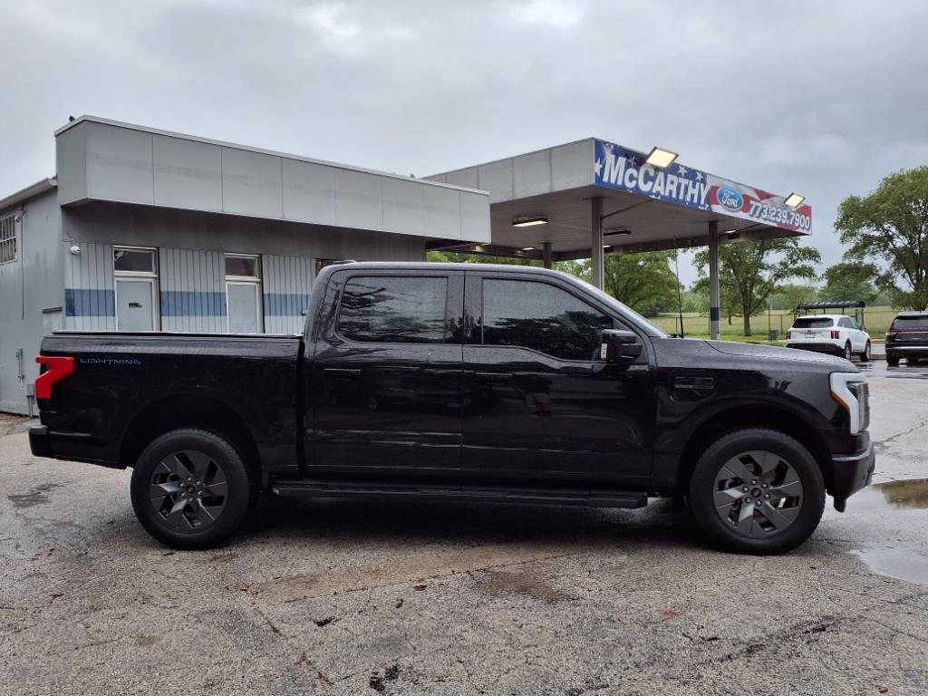 Certified 2022 Ford F-150 Lightning Lariat with VIN 1FT6W1EV5NWG07177 for sale in Chicago, IL
