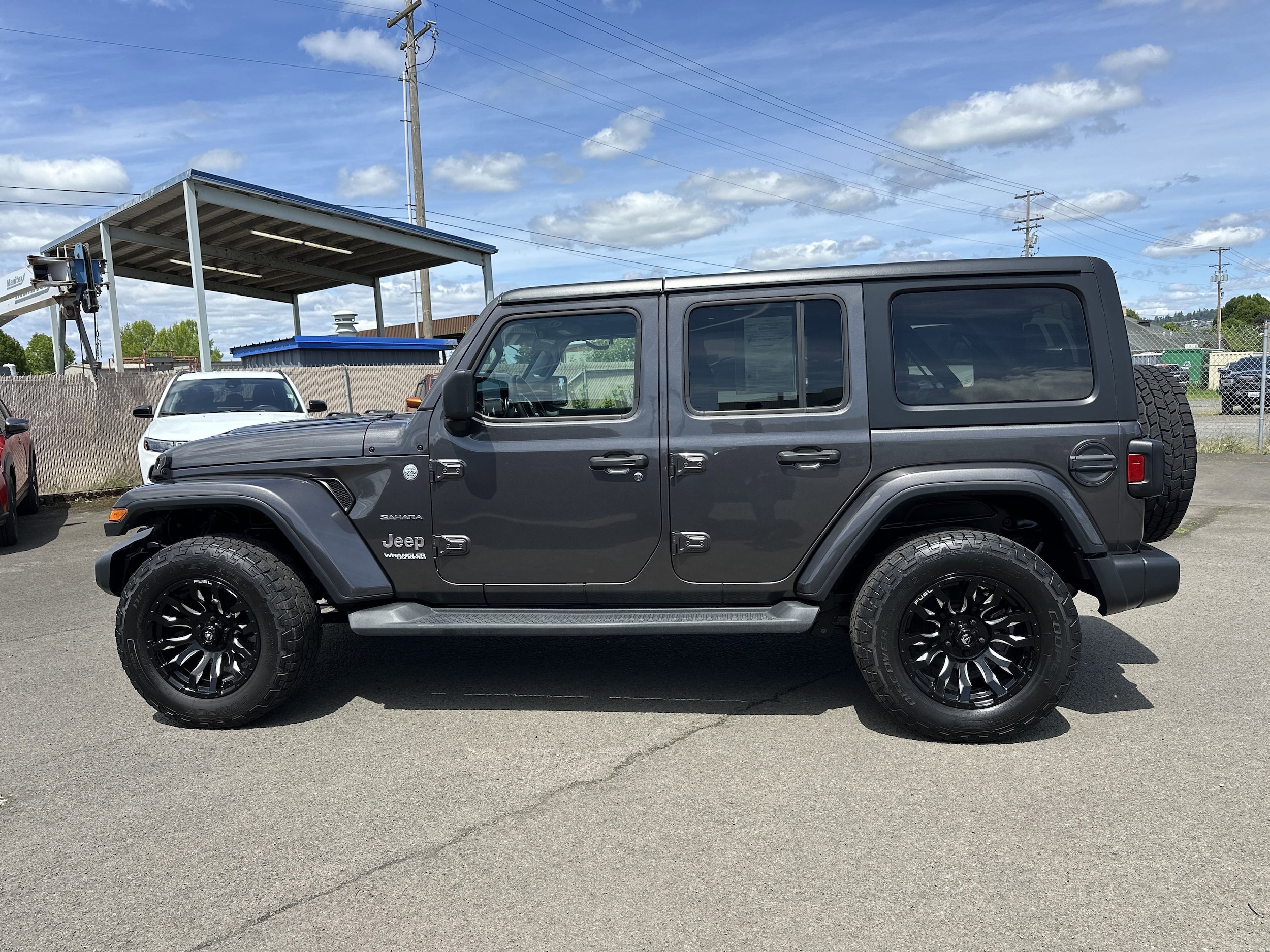 Used 2019 Jeep Wrangler Unlimited Sahara with VIN 1C4HJXEN1KW545783 for sale in Longview, WA