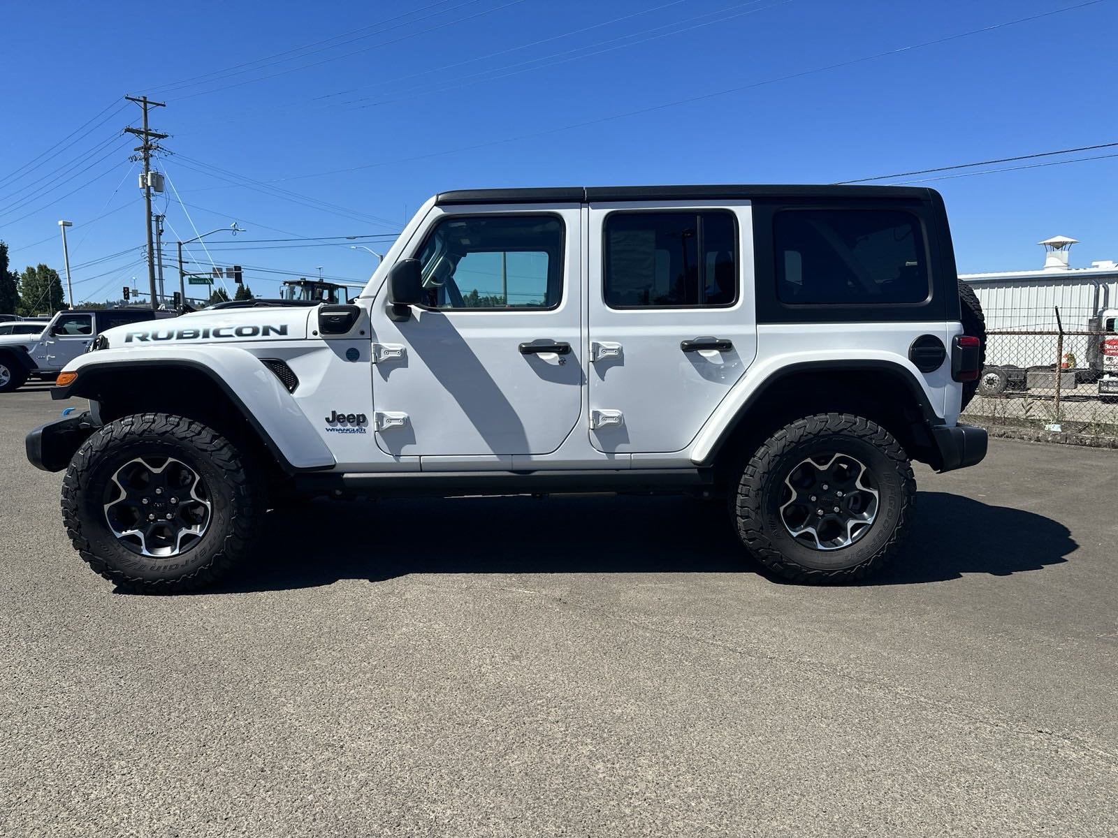 Used 2022 Jeep Wrangler Unlimited Rubicon 4XE with VIN 1C4JJXR68NW227944 for sale in Longview, WA