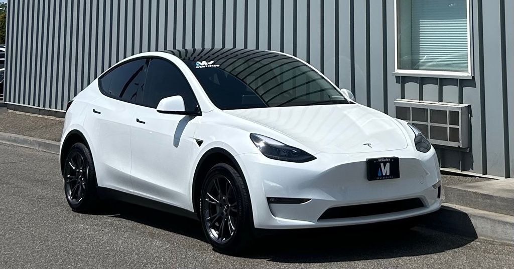 Used 2025 Tesla Model Y Long Range with VIN 7SAYGDEE2SF281199 for sale in Kansas City