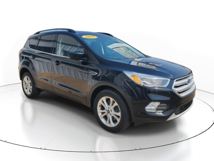 Used 2018 Ford Escape SE with VIN 1FMCU9GD6JUC22367 for sale in Clare, MI