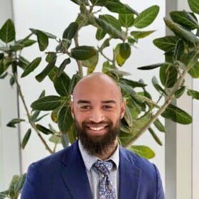 Staff member Zion Booker from ID_618555