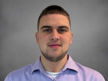 Staff member Mason Moore from ID_a1e71ca2d440