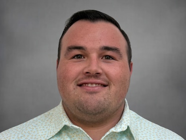 Staff member Joe Brown from ID_a1e71ca2d440