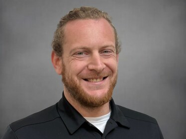 Staff member Nicholas Dolle from ID_d907e1ad0527