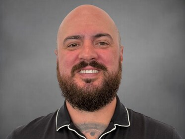Staff member Brett Petrikas from ID_32aa84