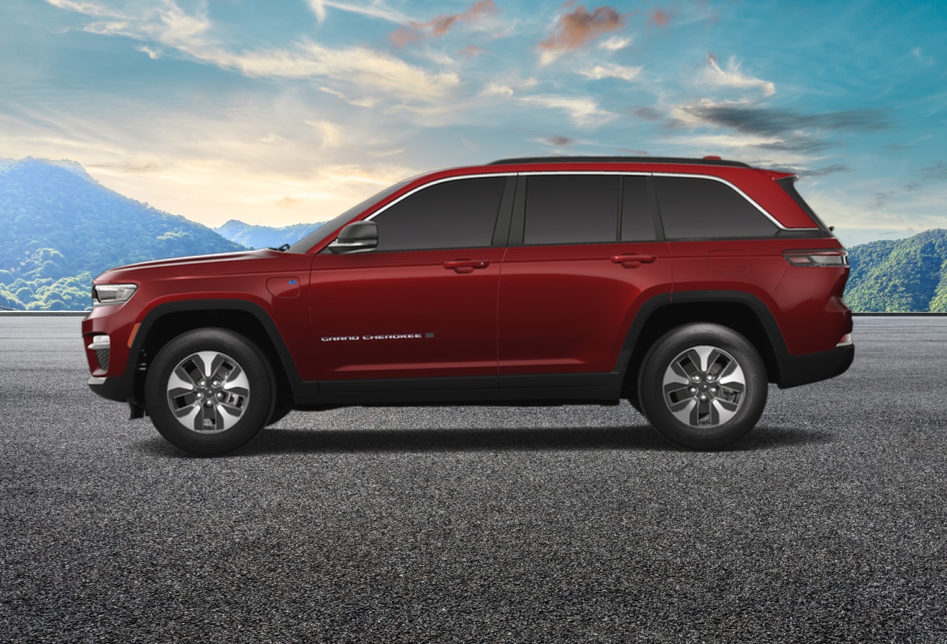 Side view of a 2025 Jeep Grand Cherokee 4xe in Velvet Red Pearl