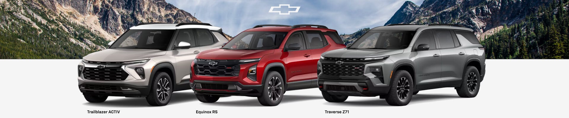 Line-up of the Chevrolet Trailblazer ACTIV, Equinox RS, and Traverse Z71 showcasing in scenic mountains.