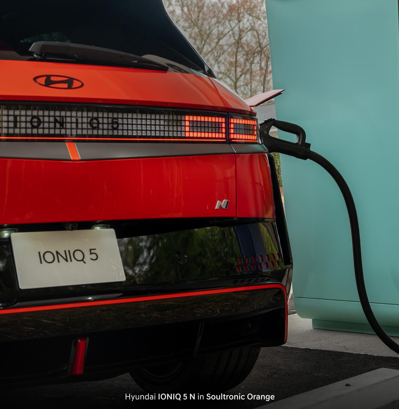 Soultronic Orange Hyundai IONIQ 5 N hooked up to a fast charger