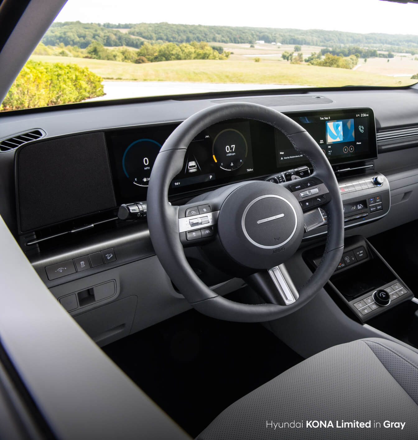 Interior driver side of a new Hyundai Kona Limited in Gray