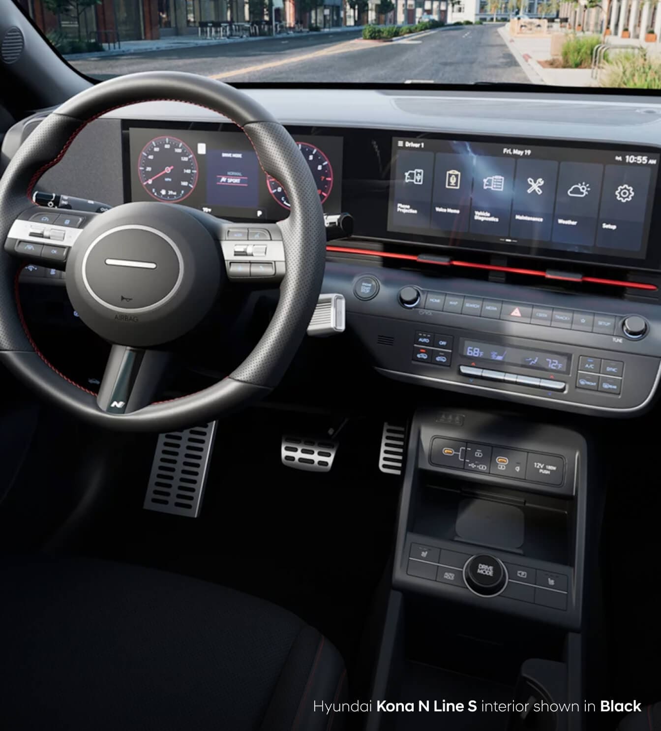 Interior view of the wheel & dashboard of the 2025 Kona N Line S showing the dual 12.3-inch digital cluster and infotainment touchscreen