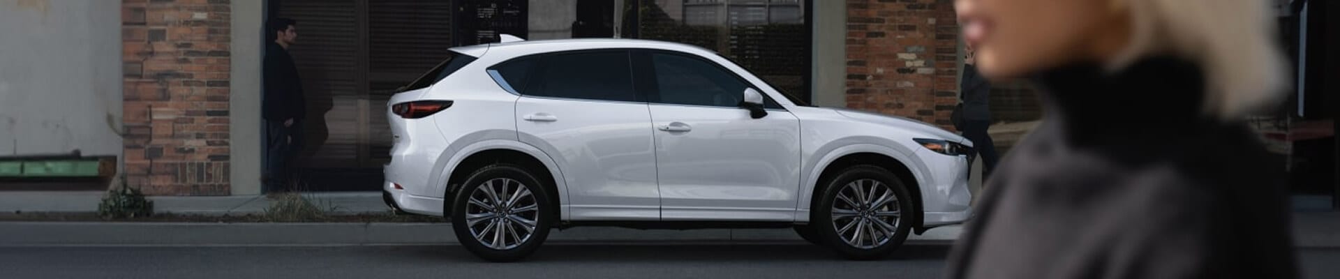 2025 Mazda CX-5 in White parked on the street