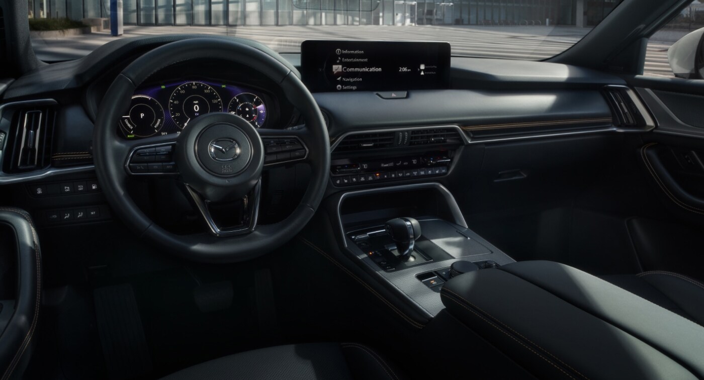 Dashboard and front seat image of a 2026 Mazda CX-90