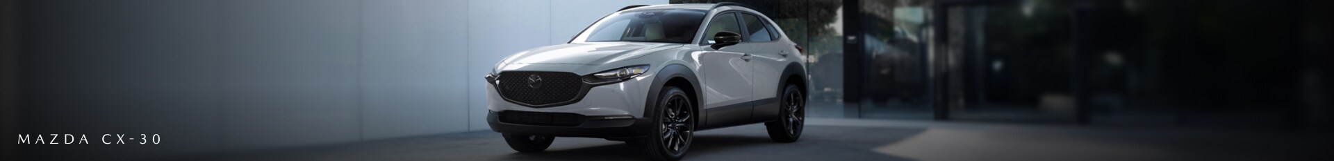 2026 Mazda CX-30 2.5 S in Aero Gray featuring black side mirrors and 18-inch alloy wheels