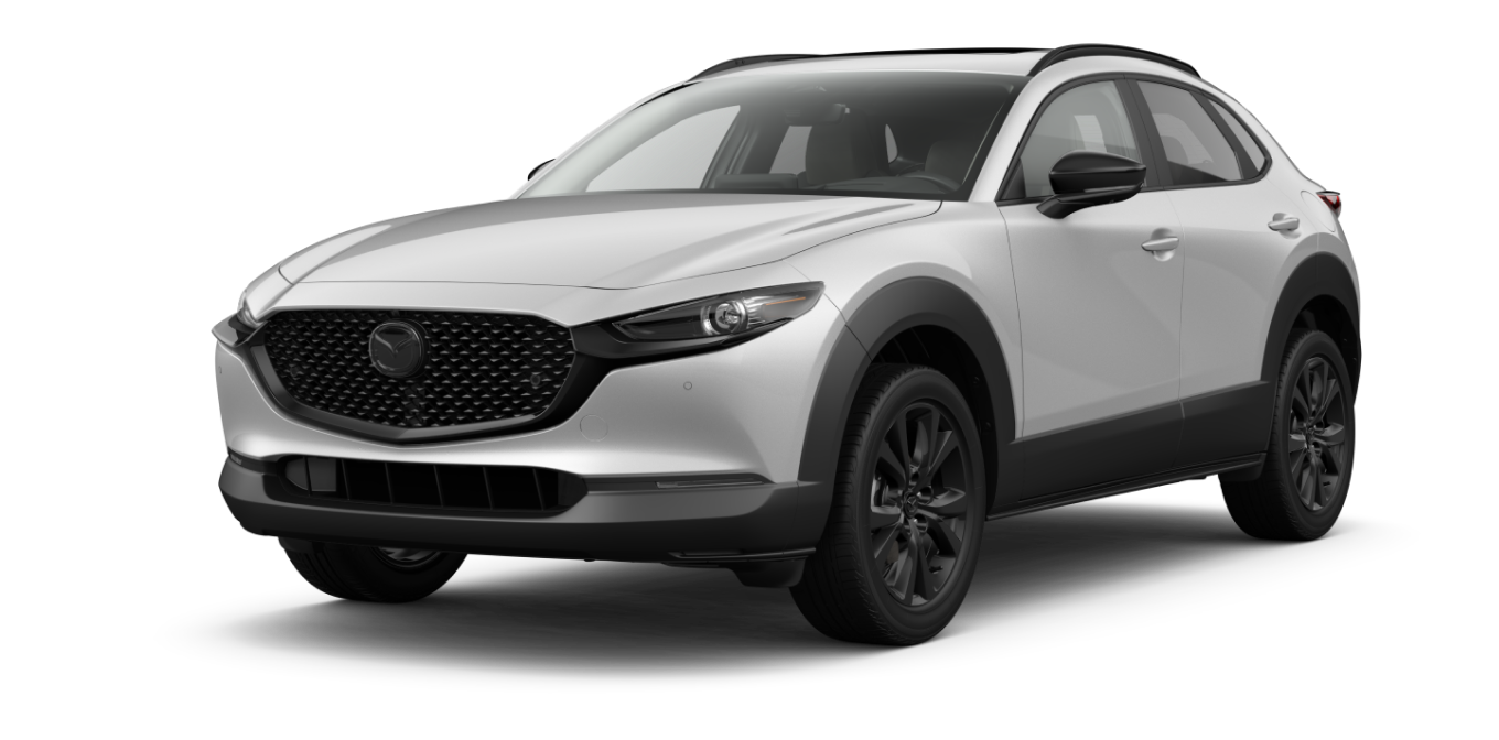 Front three-quarter studio view of a white Mazda CX-30 Turbo Aire Edition on a transparent background.
