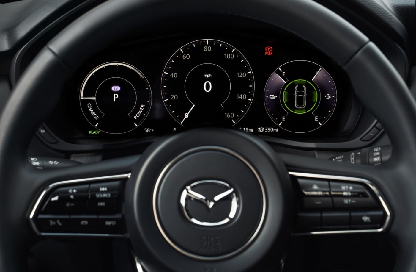 Steering wheel and digital instrument cluster of a 2026 Mazda CX-90 PHEV