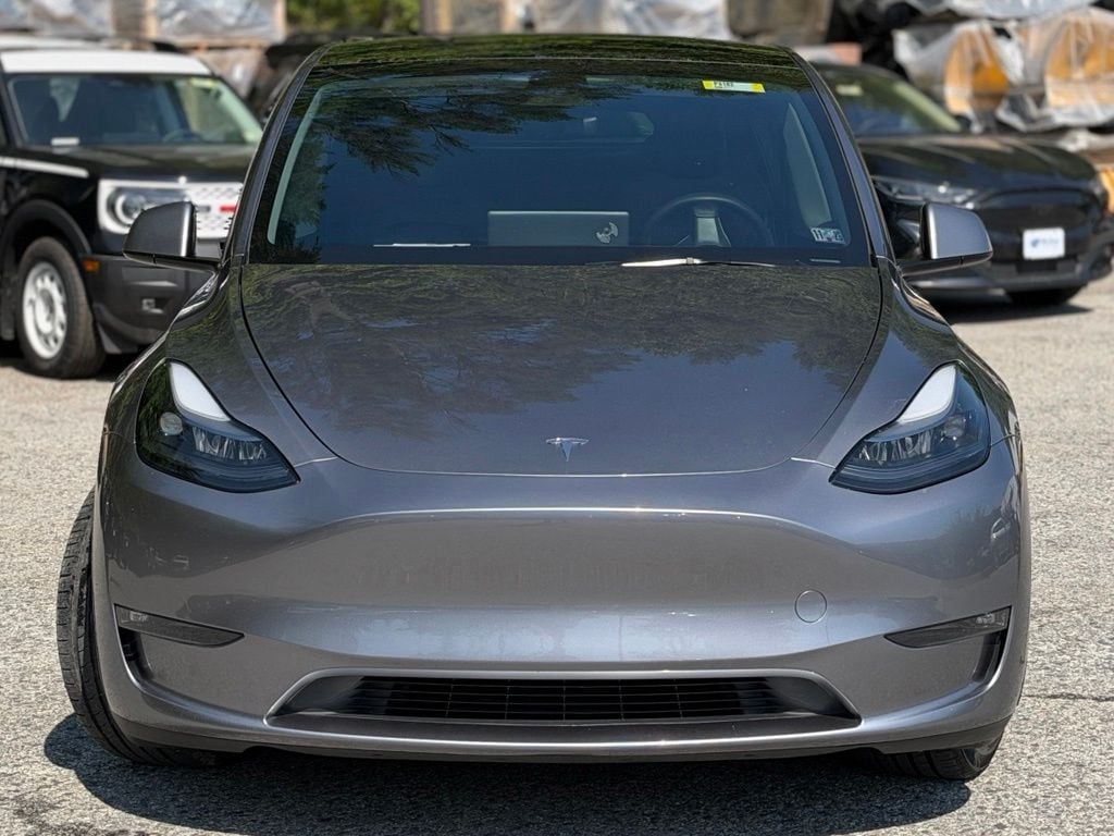 Used 2025 Tesla Model Y Long Range with VIN 7SAYGDEEXSF285470 for sale in Montpelier, VT