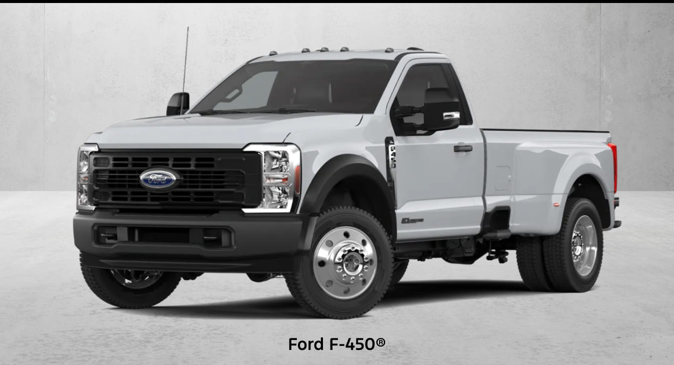 A light gray Ford F-450 pickup truck shown from a front three-quarter angle against a neutral gray background.