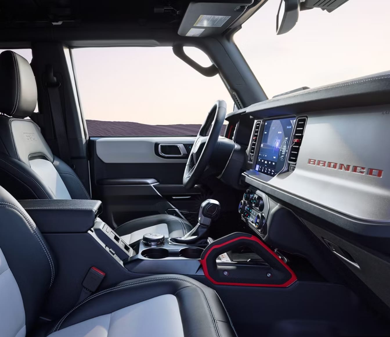 Interior shot of the front seat and dashboard of the 2026 Ford Bronco
