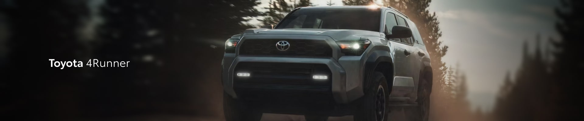 2026 Toyota 4Runner TRD Off-Road driving through a pine forest