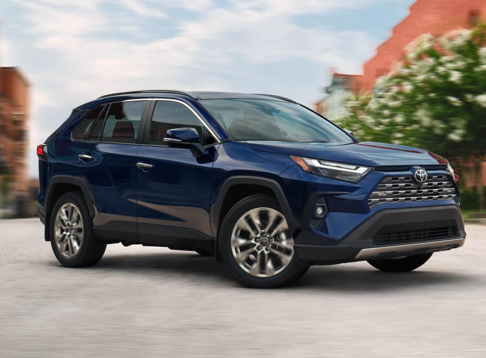 Toyota RAV4 Limited in Blueprint parked on concrete