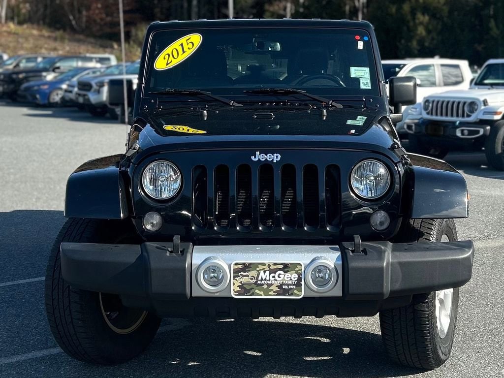 Used 2015 Jeep Wrangler Unlimited Sahara with VIN 1C4HJWEG8FL647147 for sale in Claremont, NH