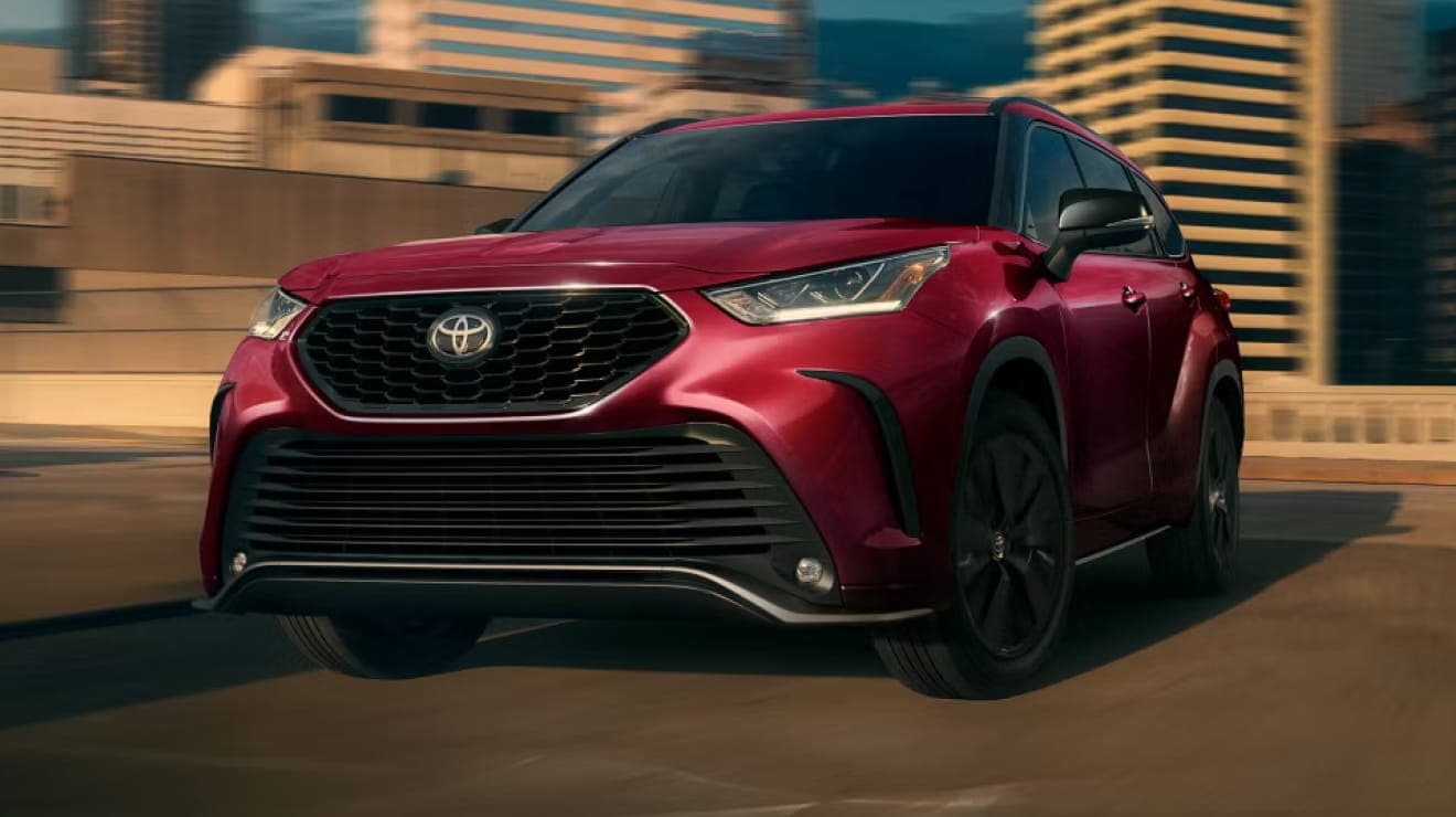 2026 Toyota Highlander XSE shown in Ruby Flare Pearl. Options shown.