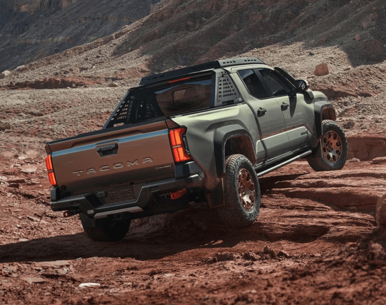 2026 Toyota Tacoma Trailhunter on rugged, red rock terrain