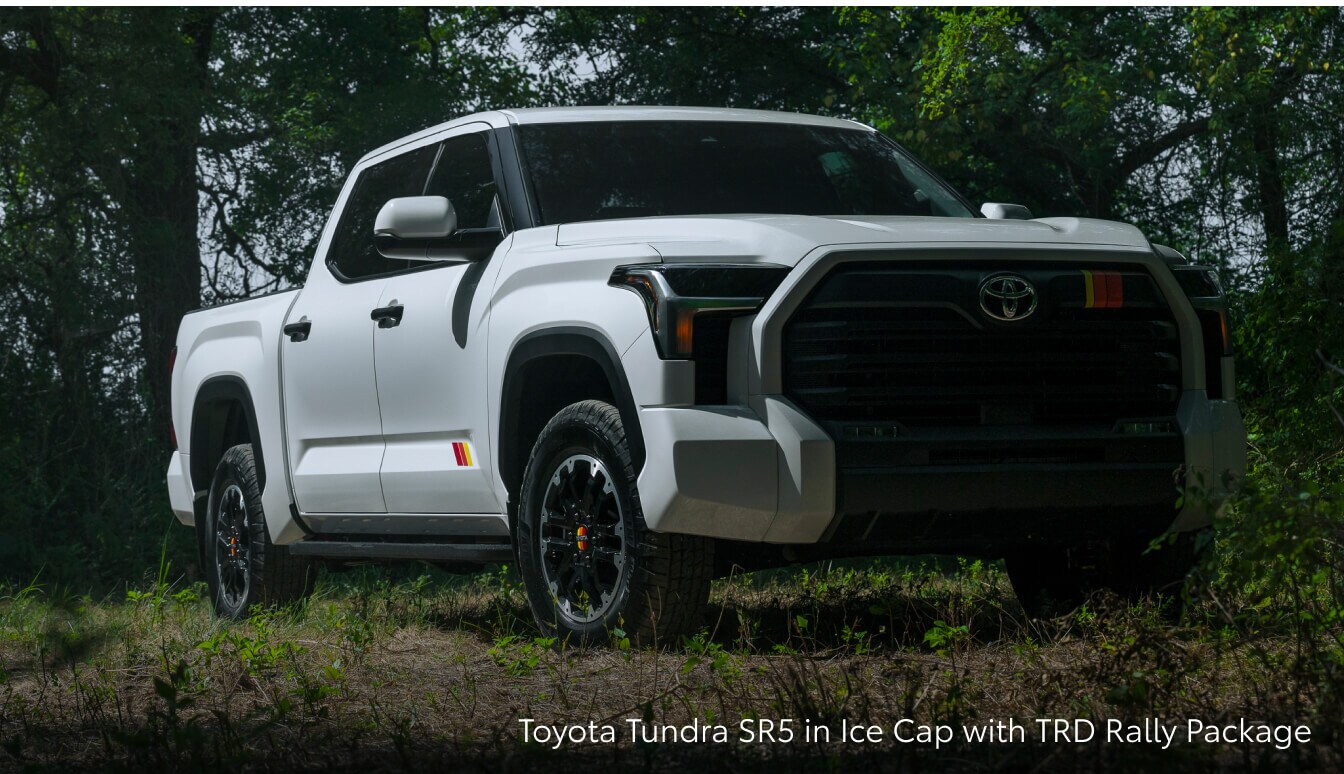 2026 Toyota Tundra SR5 in Ice Cap White with the TRD Rally Package parked in the forest