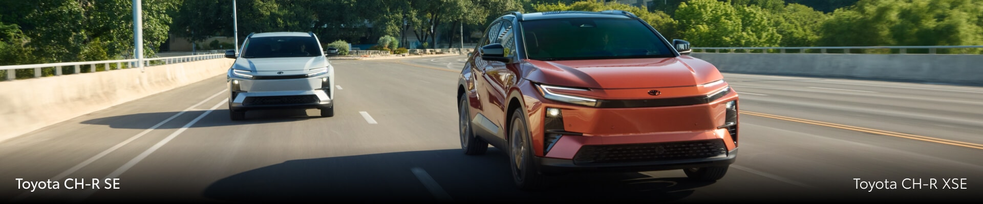 Two 2026 Toyota C-HR EVs driving on a highway