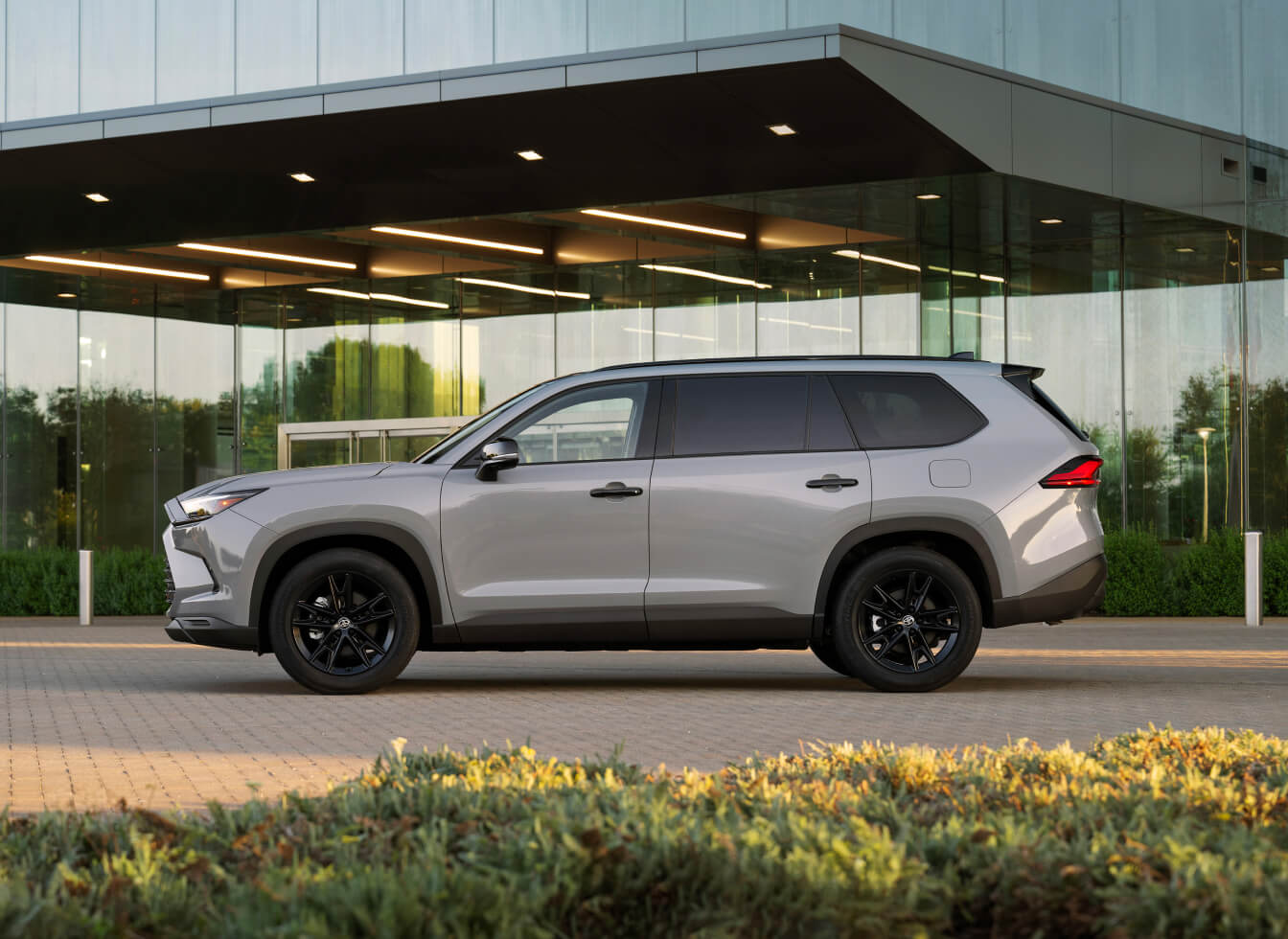 Side view of 2026 Toyota Grand Highlander Nightshade in Grey.