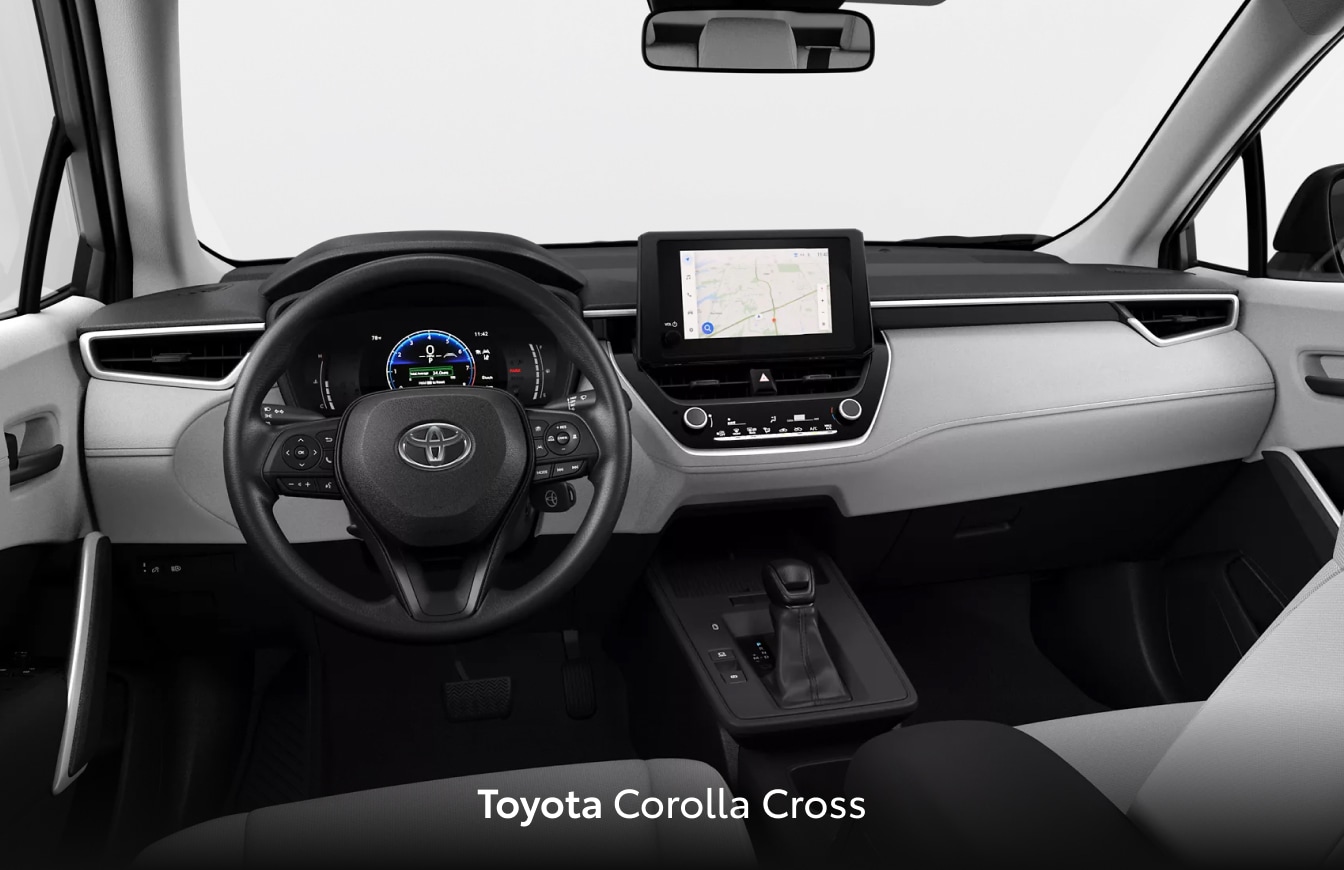 Interior front seat and dashboard view in a Toyota Corolla Cross
