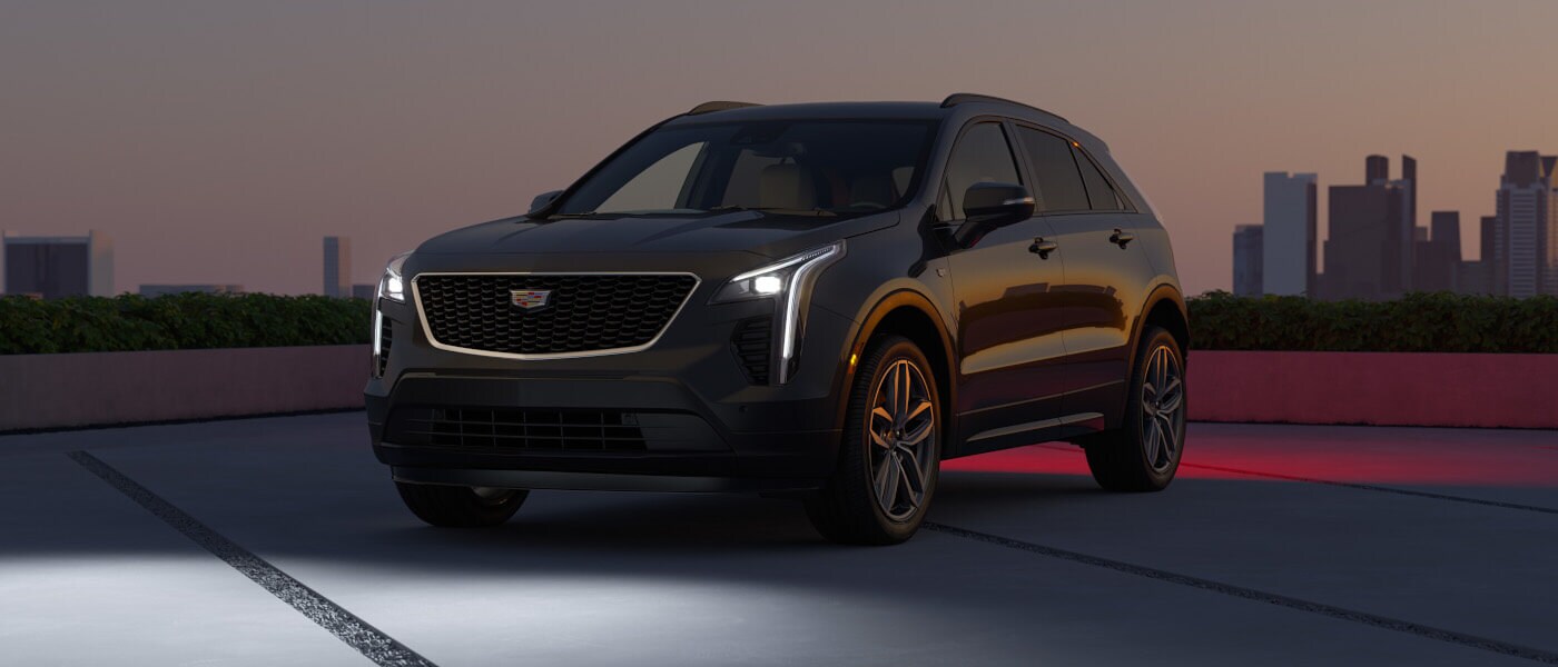 2025 Cadillac XT4 Exterior By City Skyline At Dusk