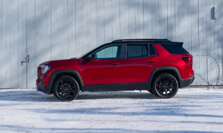 2025 GMC Terrain Exterior Side View Near Snowy Barn