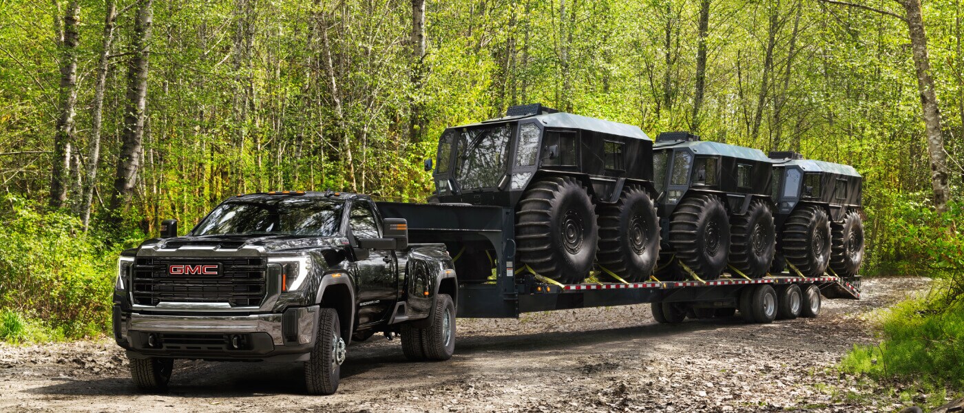 2026 GMC Sierra 3500 Exterior Pulling Trailer With Vehicles