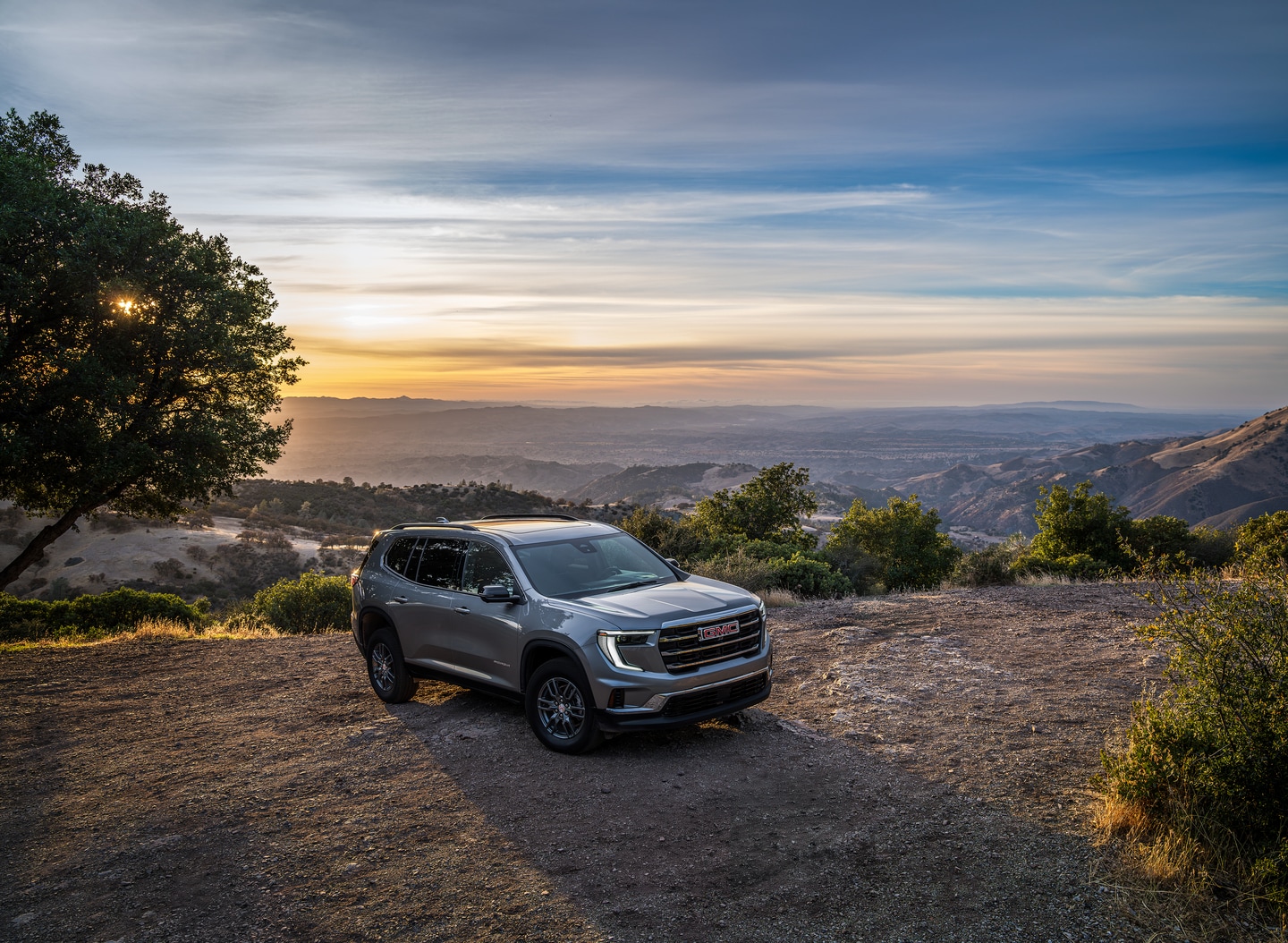 GMC Acadia parked by scenic view