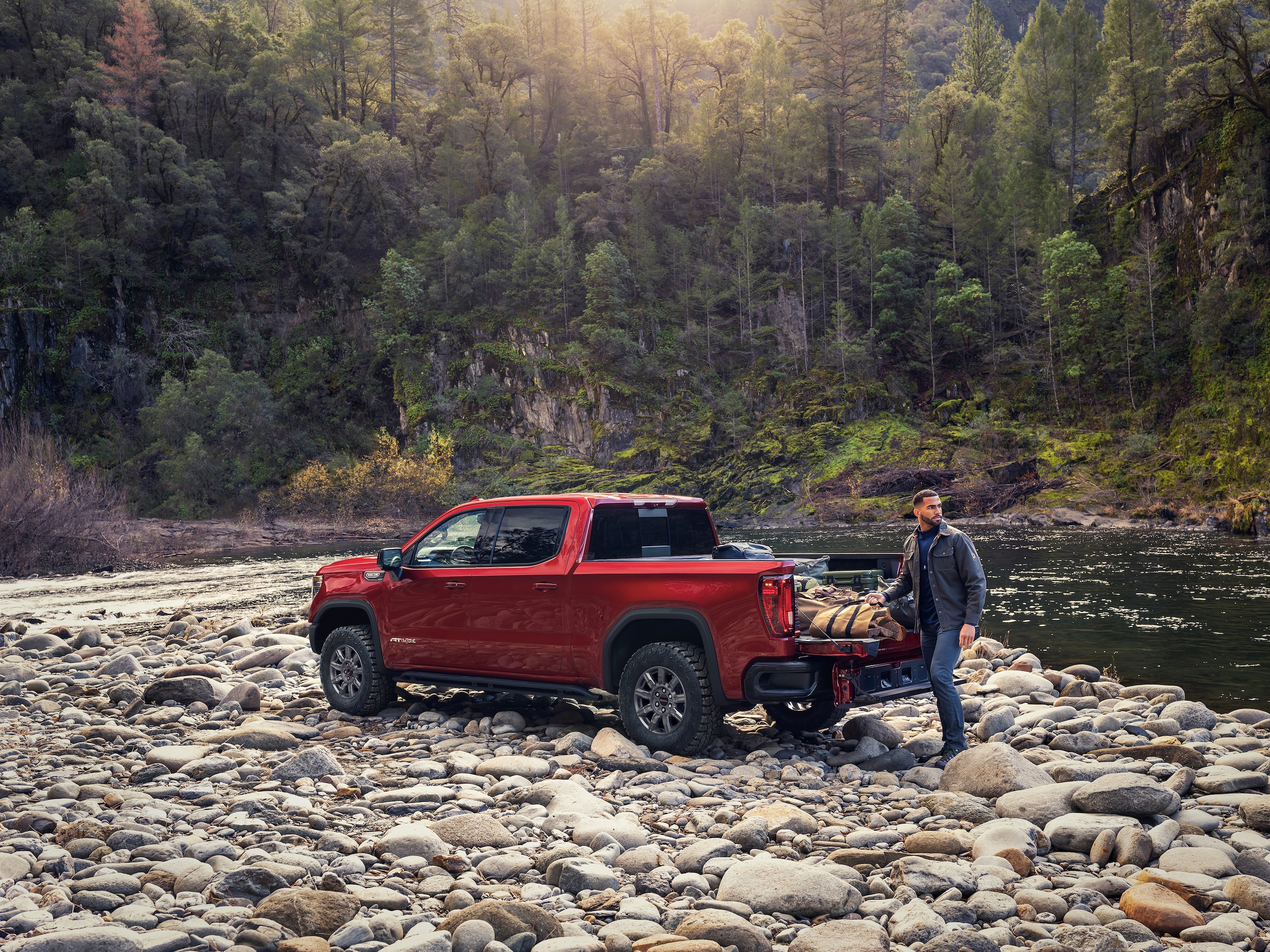 2024 GMC Canyon on rocks by stream