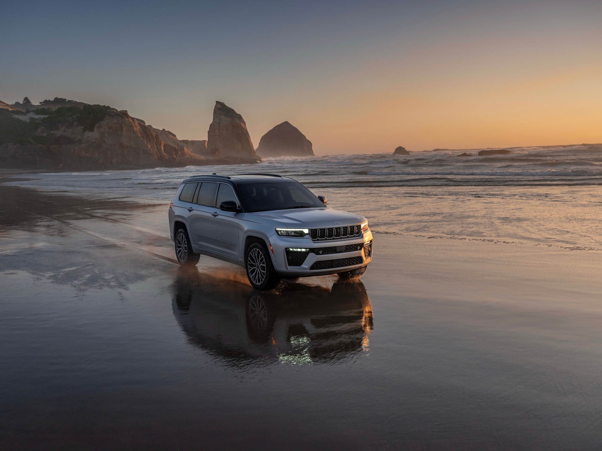  2026 Jeep Grand  Cherokee driving on the beach