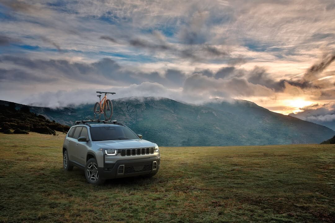  Person cheerfully signing documents.